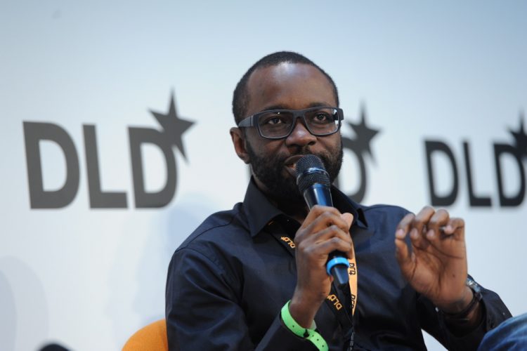 MUNICH/GERMANY - JANUARY 20: Tayo Ovisou (Pago) gestures speaking on a panel discussion during the DLD15 (Digital-Life-Design) Conference at the HVB Forum on January 20, 2015 in Munich, Germany. DLD is a global network of innovation, digitization, science and culture, which connects business, creative and social leaders, opinion formers and influencers for crossover conversation and inspiration.(Photo: picture alliance / Jan Haas)