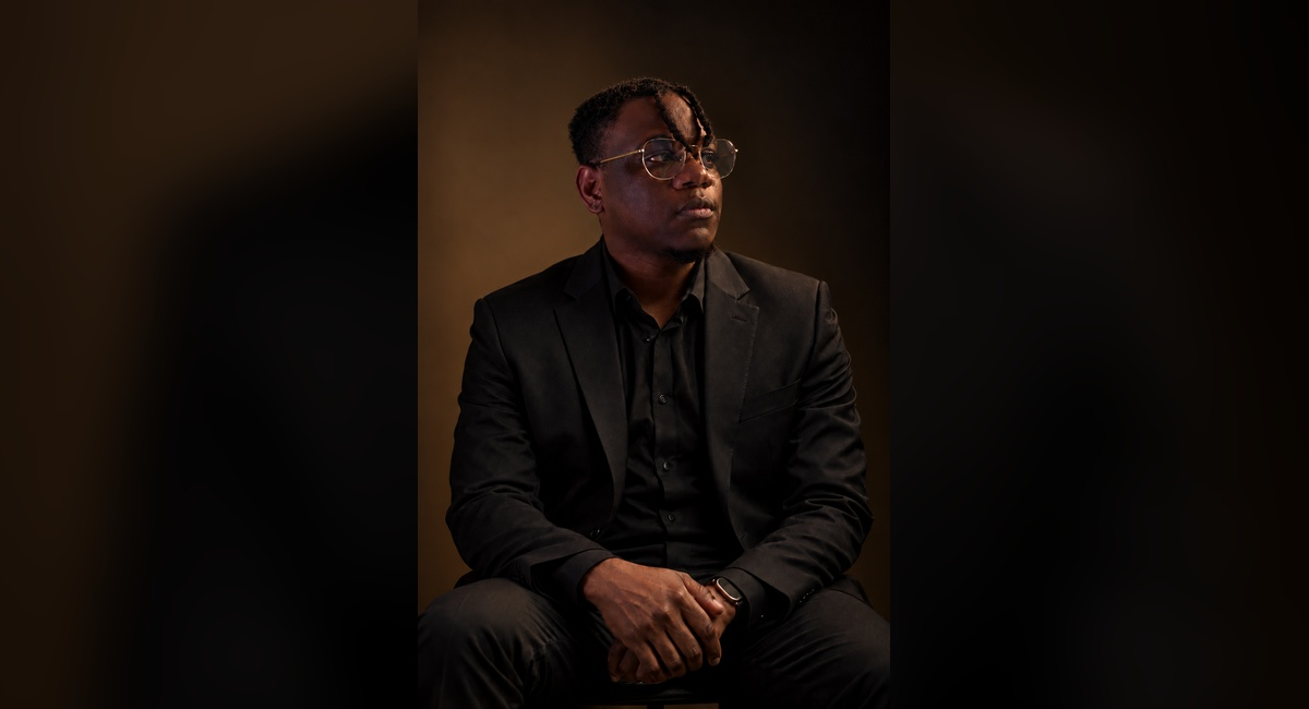 Ayomide Olukoga, a Lead Product Designer specialising in digital product strategy, interface architecture, and human-centred design systems